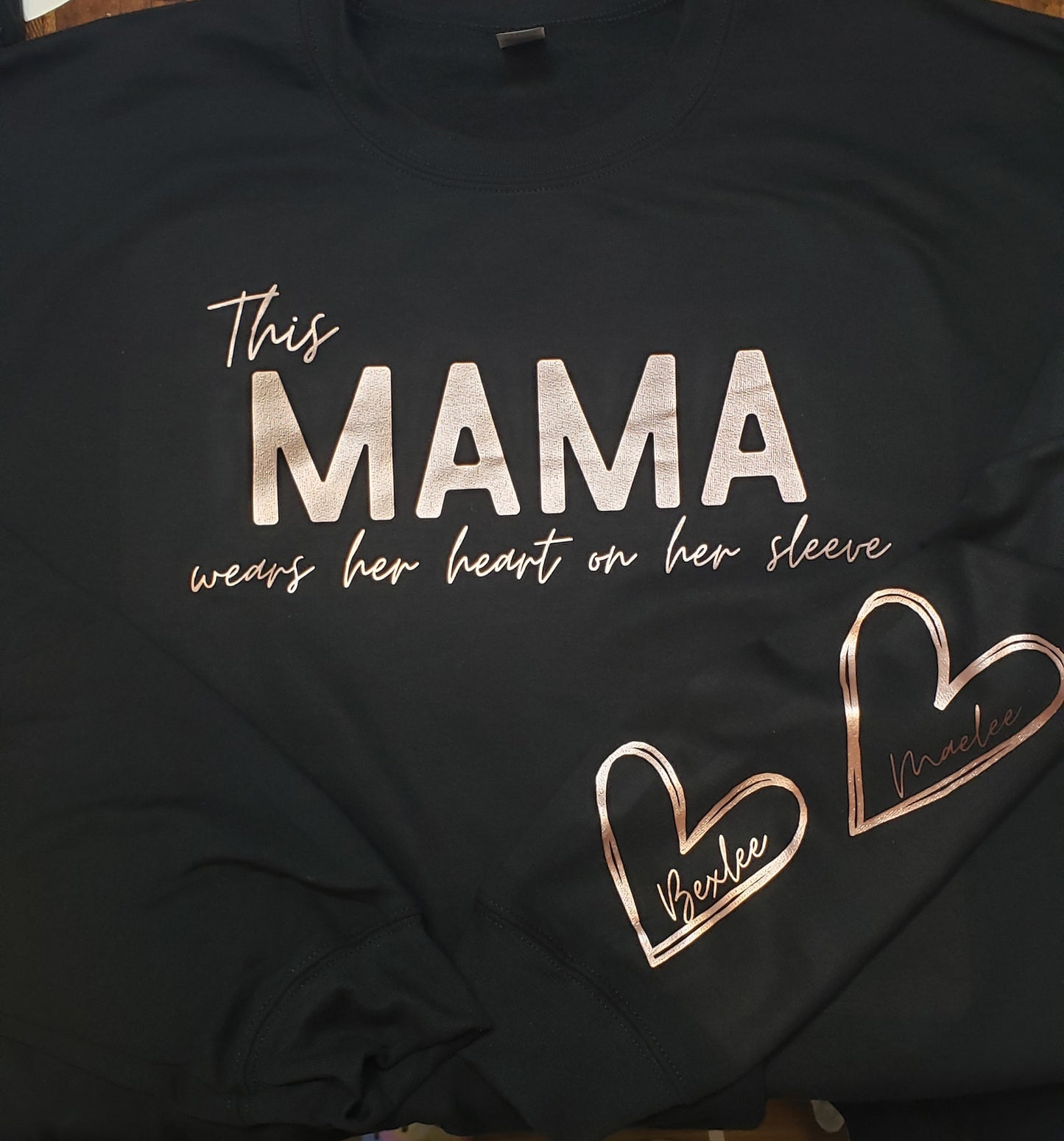 This Mama Wears Her Heart On Her Sleeve Black Personalized Sweatshirt